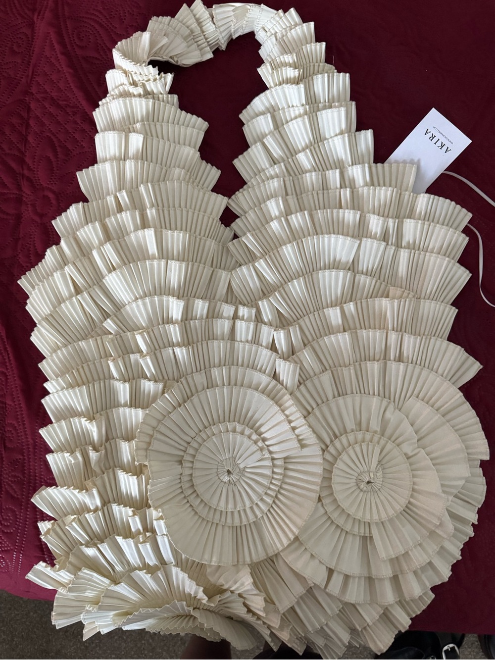 AKIRA Ivory Pleated Rosette Halter Top